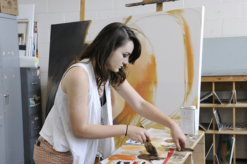 Painter in the FAF painting studio at Adelphi