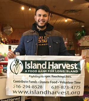 Adelphi student involved with Island Harvest