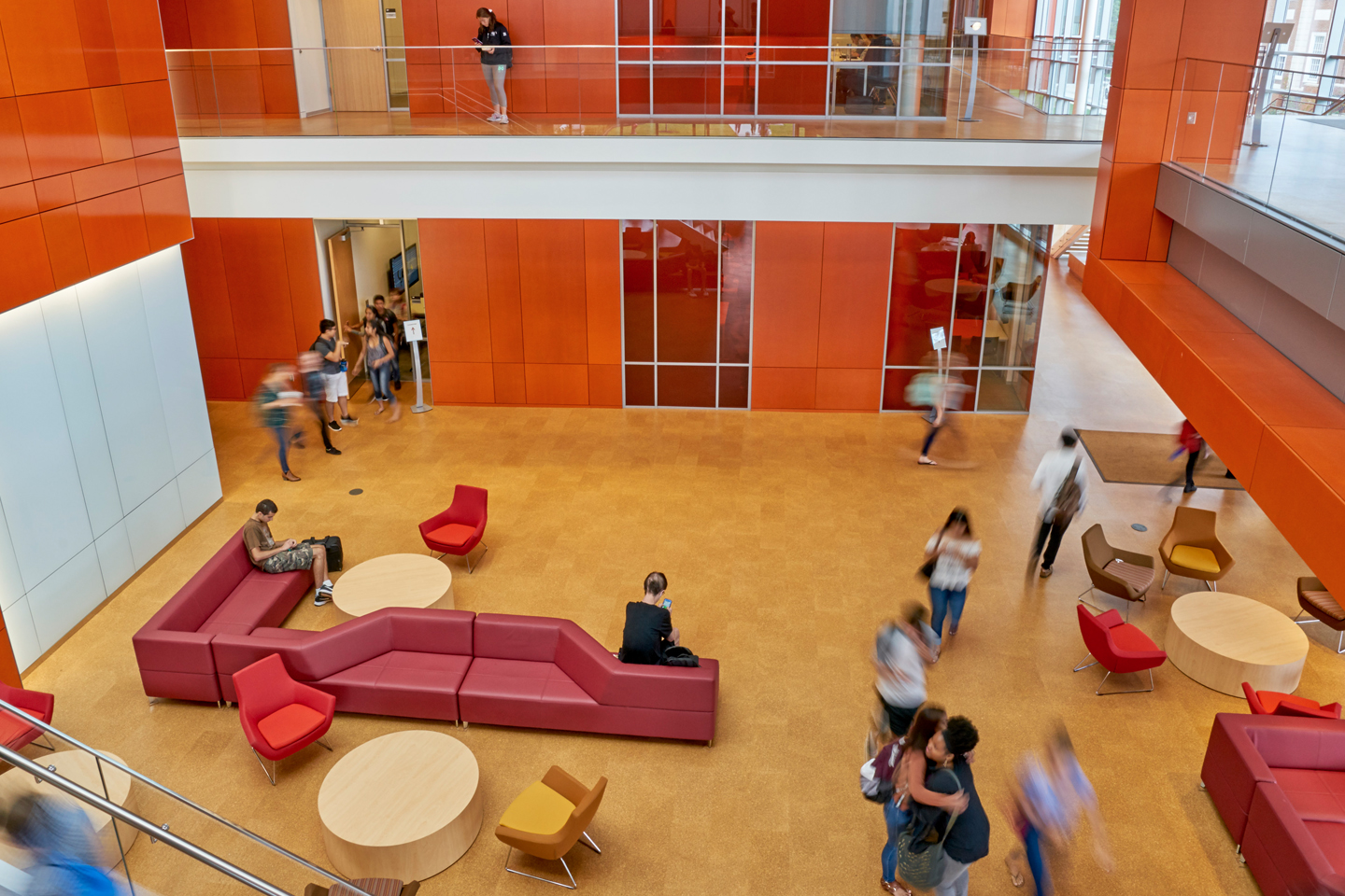 Students bustle on each floor of the three-story Nexus Building.