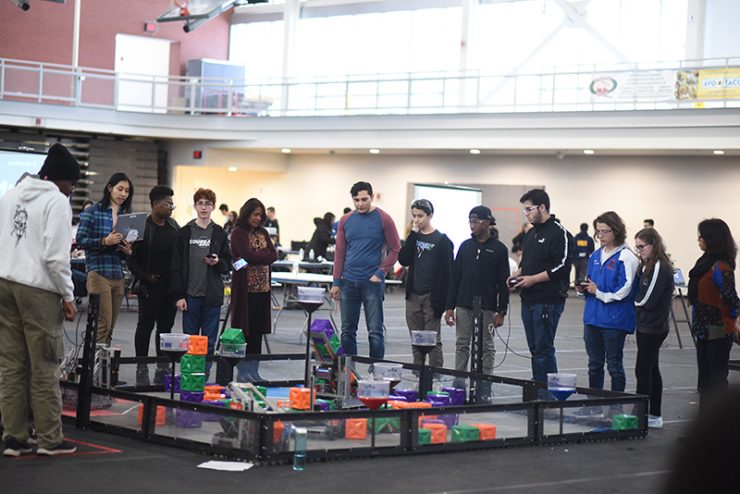 Students from high schools on Long Island compete in a robotics competition at Adelphi University.