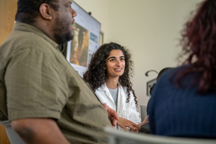 A psychology student engaged in classroom discussion