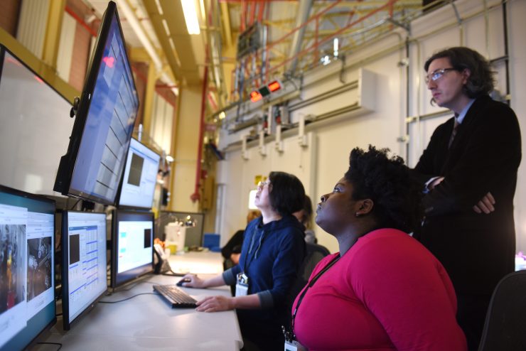 Assistant Professor Ivan Fabe Dempsey Hyatt, PhD, and Adelphi student Marly Medard at Long Island’s Brookhaven National Laboratory.