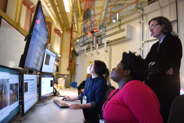 Assistant Professor Ivan Fabe Dempsey Hyatt, PhD, and Adelphi student Marly Medard at Long Island’s Brookhaven National Laboratory.