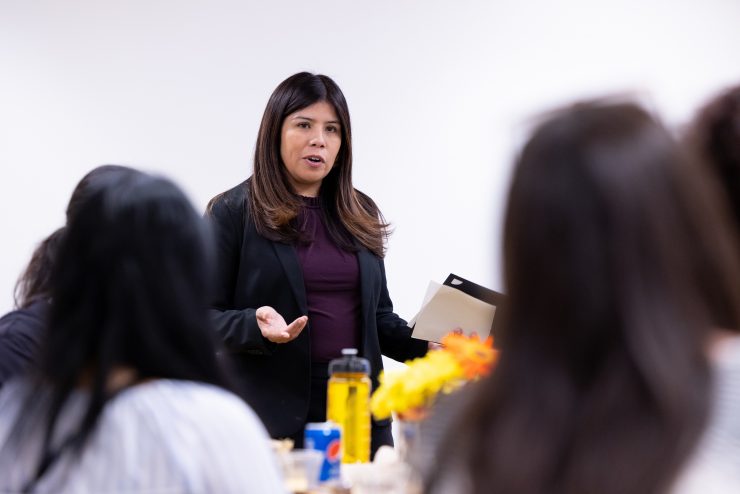 Sandra Castro speaking to a group of Adelphi non-traditional students in the College of Professional and Continuing Studies (CPCS)