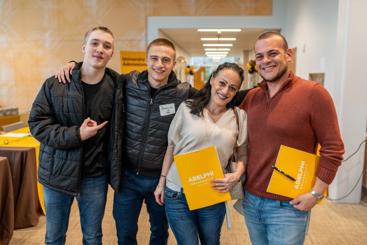 Adelphi family at an accepted student day event.