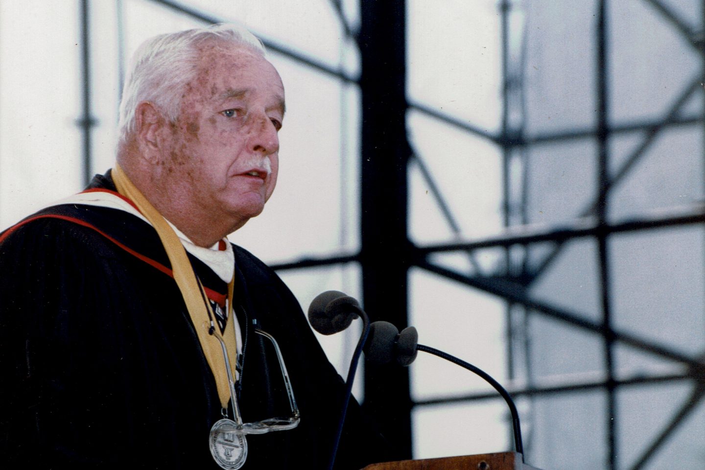 Professor Warren Eickelberg speaking at an Adelphi University Commencement Ceremony