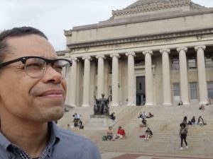 Alberto Cruz in front of a courthouse.
