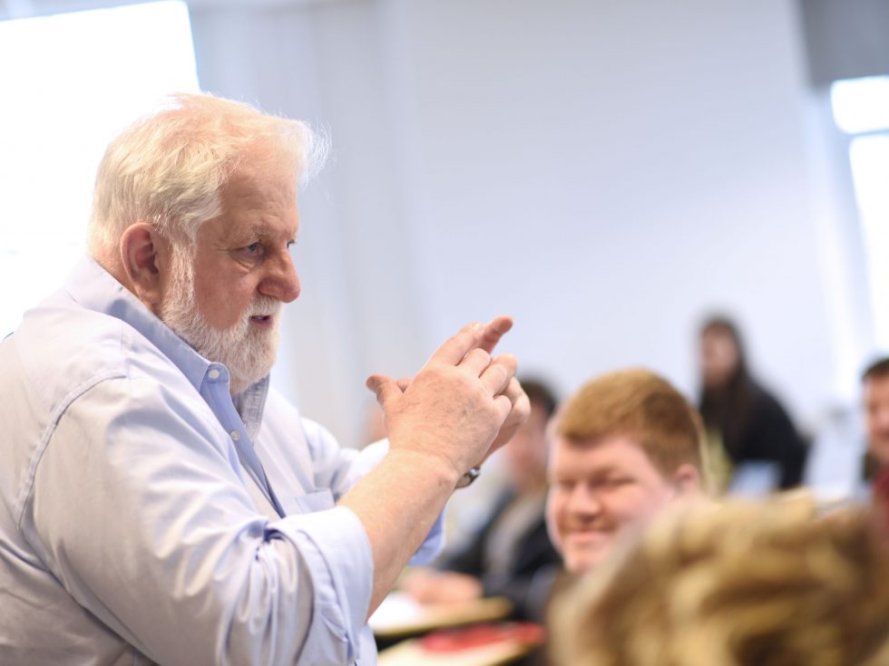 Professor Sal Primeggia lectures an engaged Adelphi University sociology class.