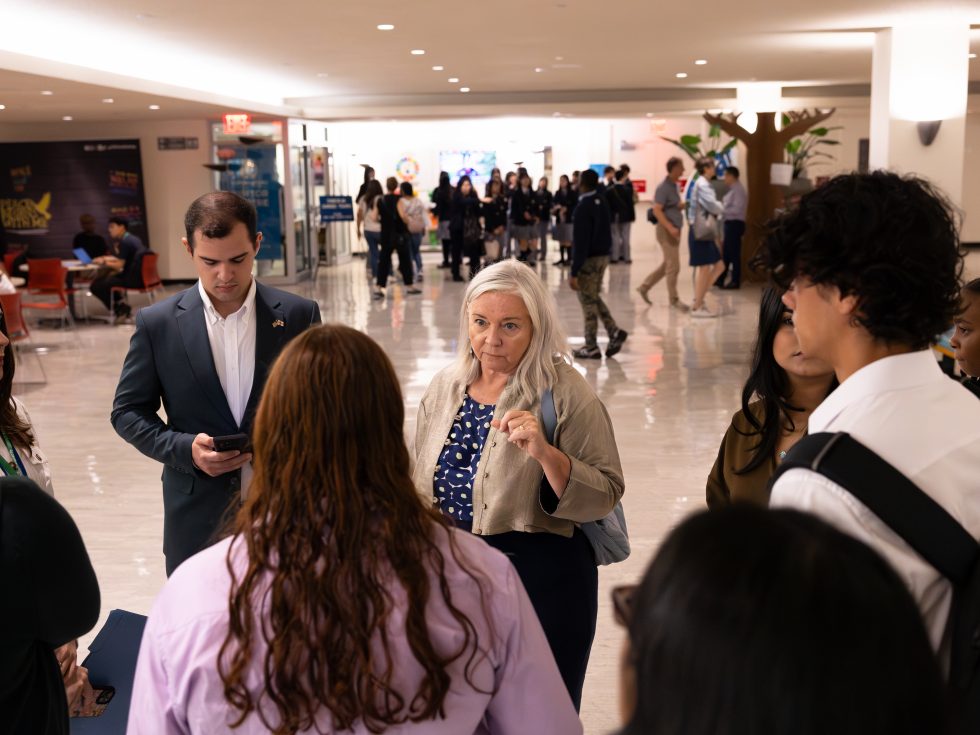 Katie Laatikainen with a group of Adelphi students in the United Nations