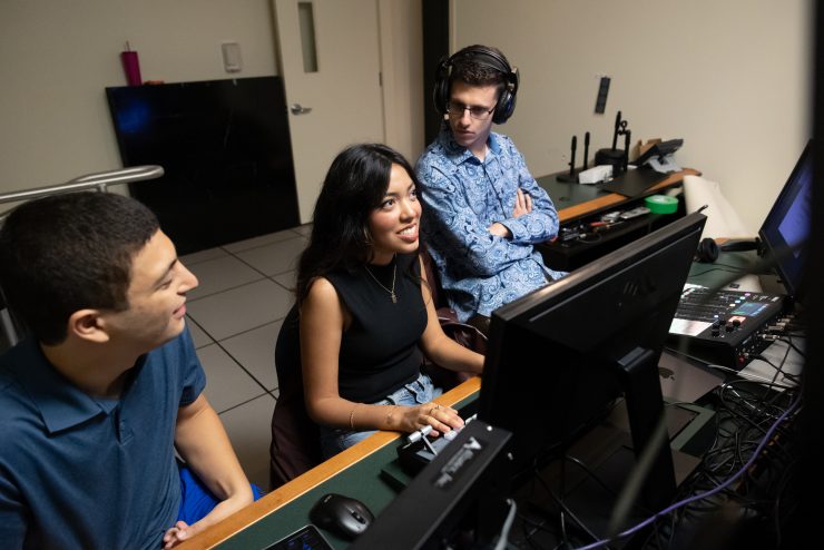 A communications student interviewing.