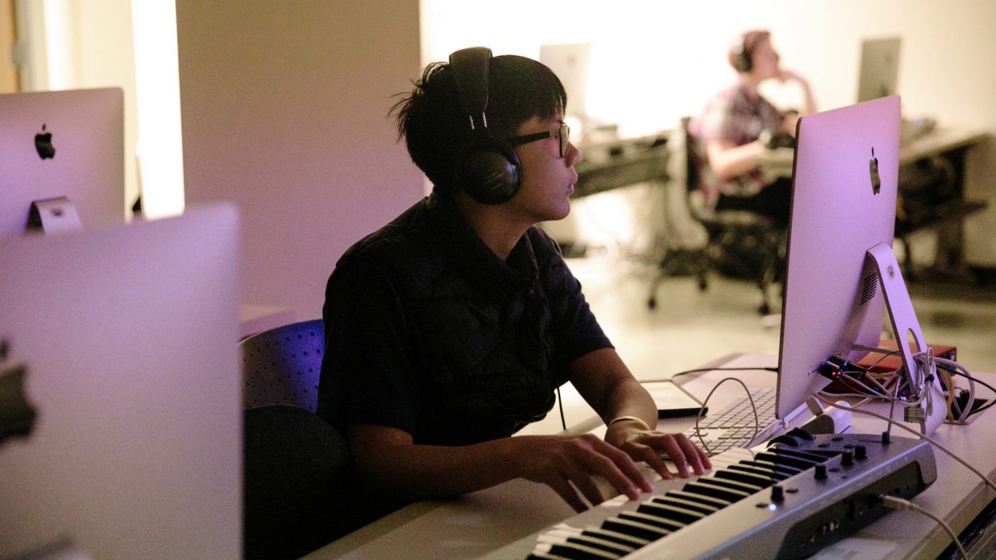 Pre-college students compose and produce original tracks using digital tools in Adelphi’s music technology lab.