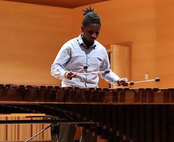 Student percussionist on Adelphi Stage