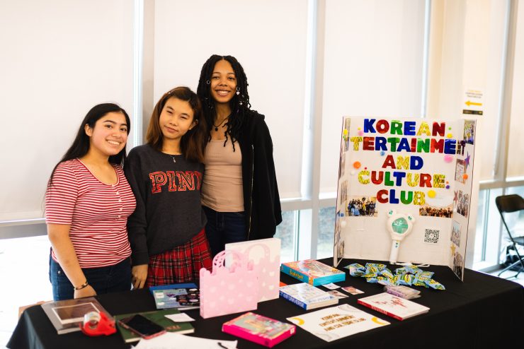 Adelphi University Club Fair: Korean Entertainment and Culture Club table with student leaders.