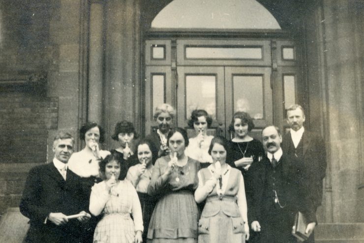 Adelphi College Faculty eating popsicles, 1921