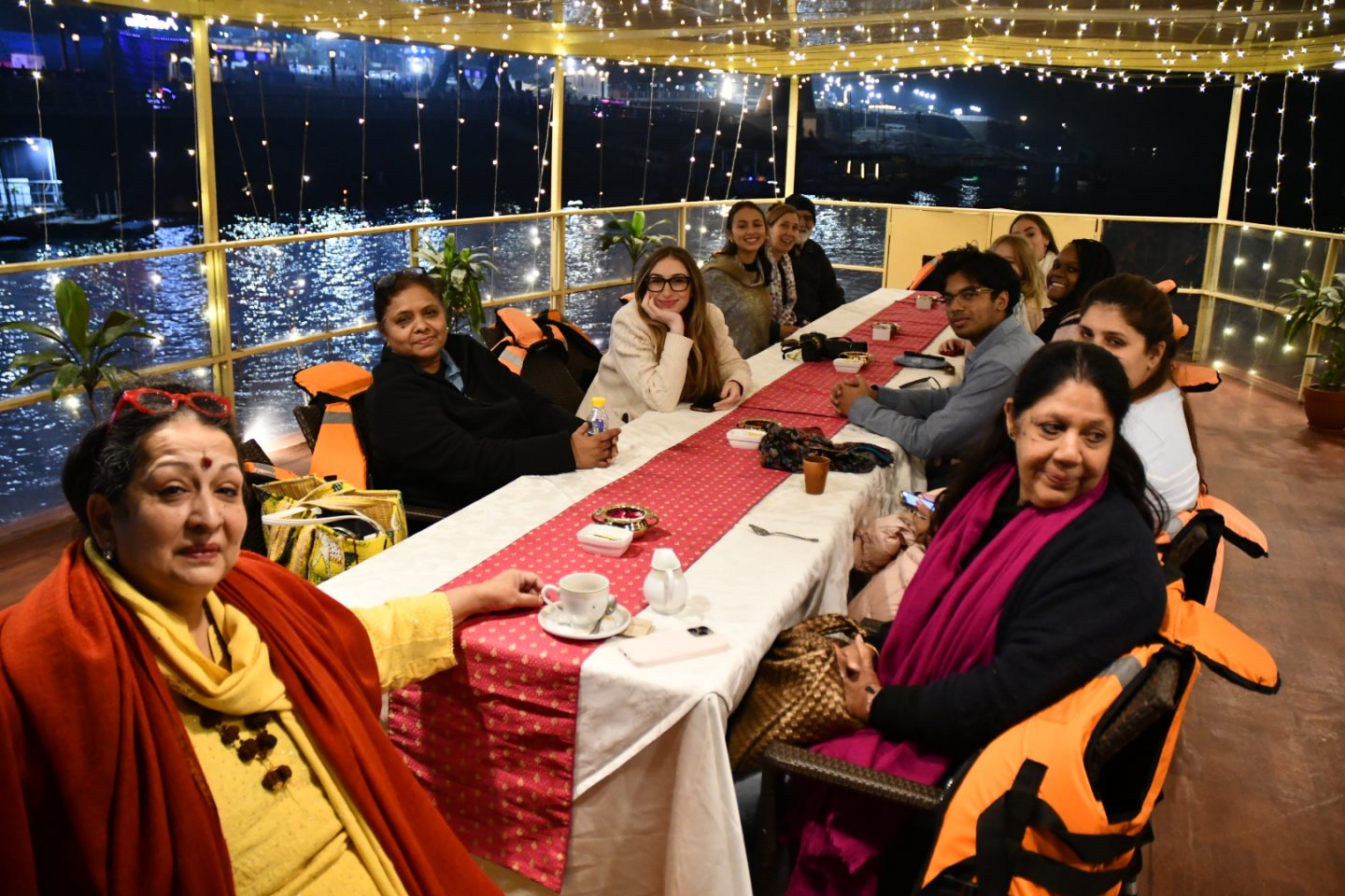 An evening boat tour on the River Ganga along the ghats of the holy city of Varanasi, hosted by Mr. and Mrs. Bhisé