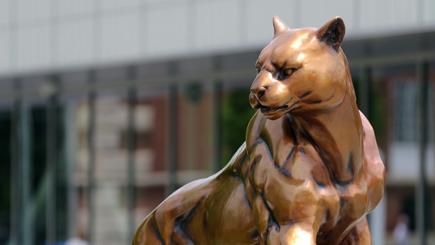 Adelphi University panther statue on campus.