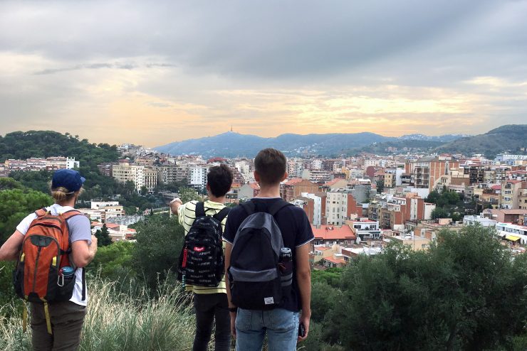 Adelphi students looking out at a gorgeous sunset overlooking Barcelona, Spain.