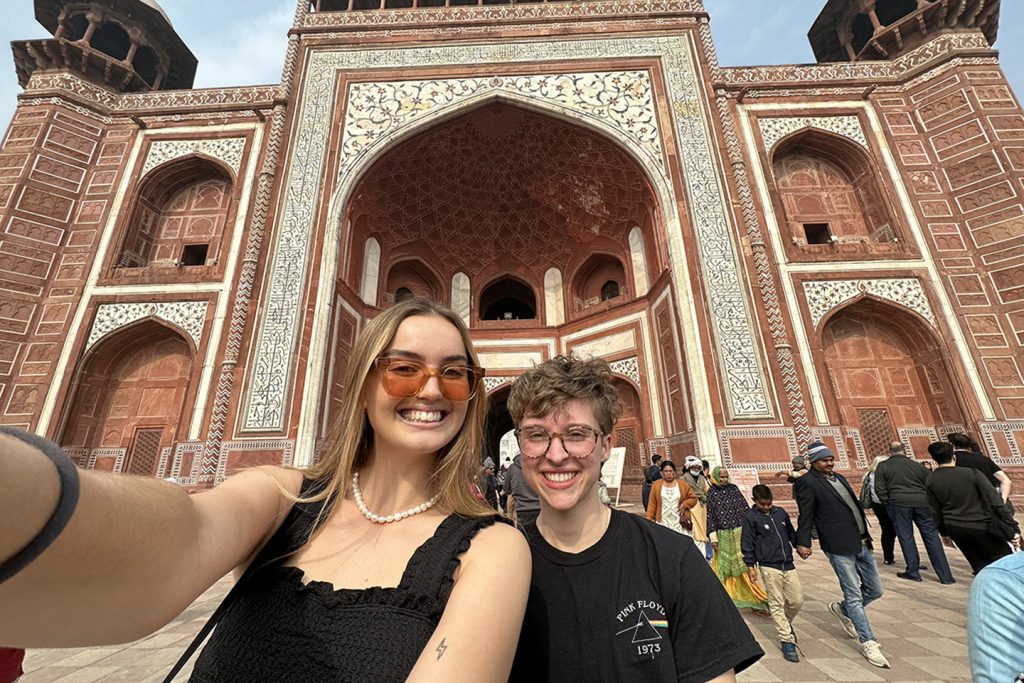 Adelphi University students at the entrance to the Taj Mahal
