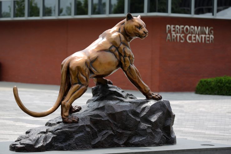 Adelphi Panther brass statue. Garden City Campus