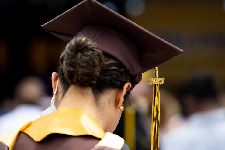 Grad with 2023 tassel - Adelphi University