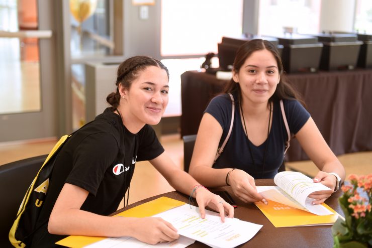 Two students at an Hispanic College Readiness event at Adelphi