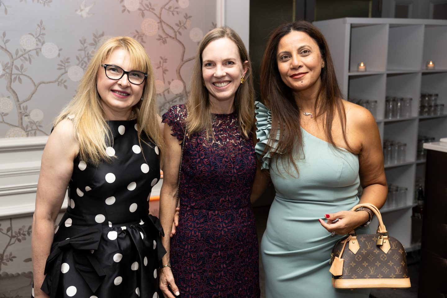 Adelphi faculty leaders gather at the 2026 University Gala. From left: Justyna Widera-Kalinowska, professor of chemistry and director of the SPARK Center; MaryAnne Hyland, dean of the Robert B. Willumstad School of Business; and Raghida Abdallah Yassine, assistant professor of business and 2026–2027 Faculty Senate chair.