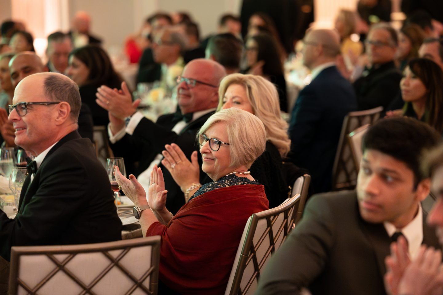 Gala guests applaud a performance of “For Good” from the musical Wicked.