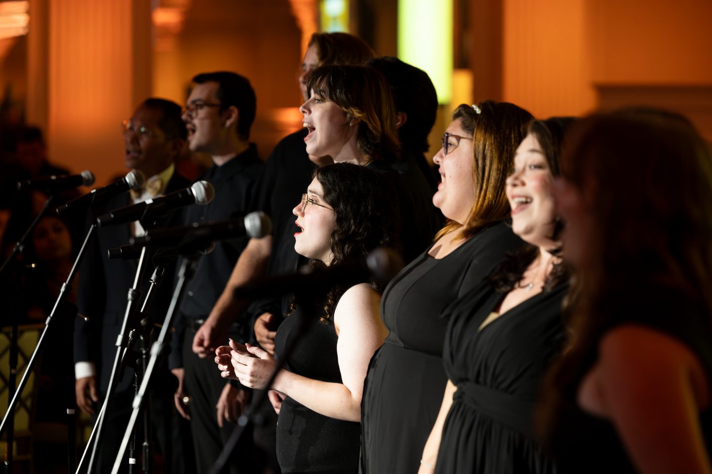 Adelphi students, faculty and staff perform “For Good” from the musical Wicked during the gala program.