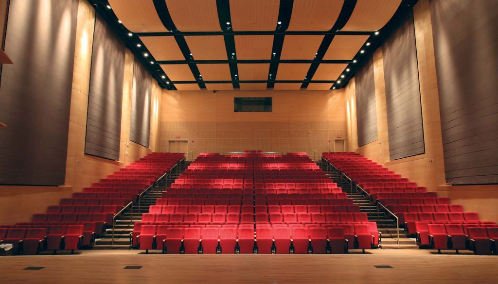A view of the red seats in the Adelphi University Performing Arts Center Concert Hall.