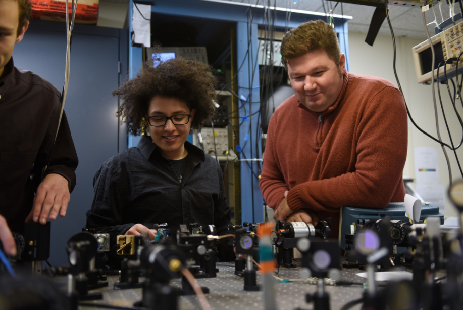 Student with faculty member working in engineering lab