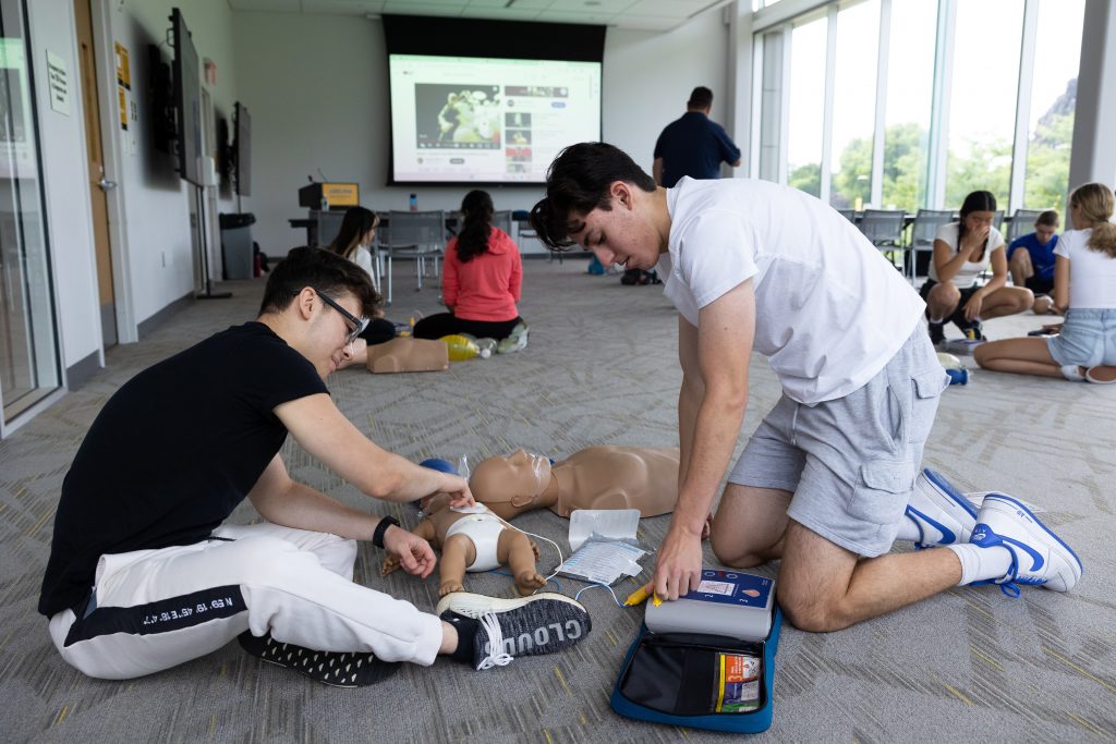 High School students learn CPR training at Adelphi University