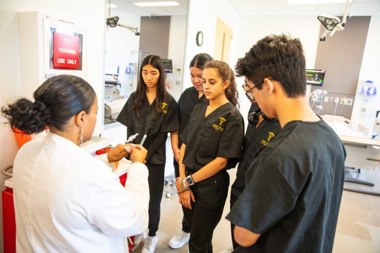 Pre-college nursing students participate in hands-on simulations in Adelphi’s state-of-the-art Clinical Education and Simulation Lab.