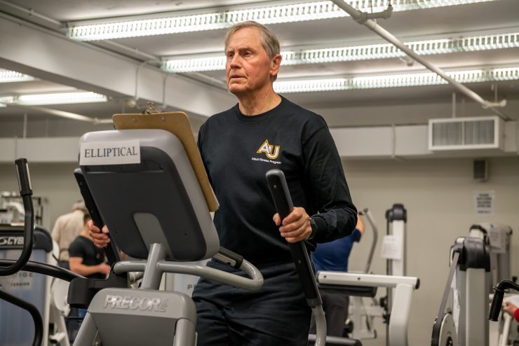 Adult Fitness Program at Adelphi University - Man working on fitness equipment