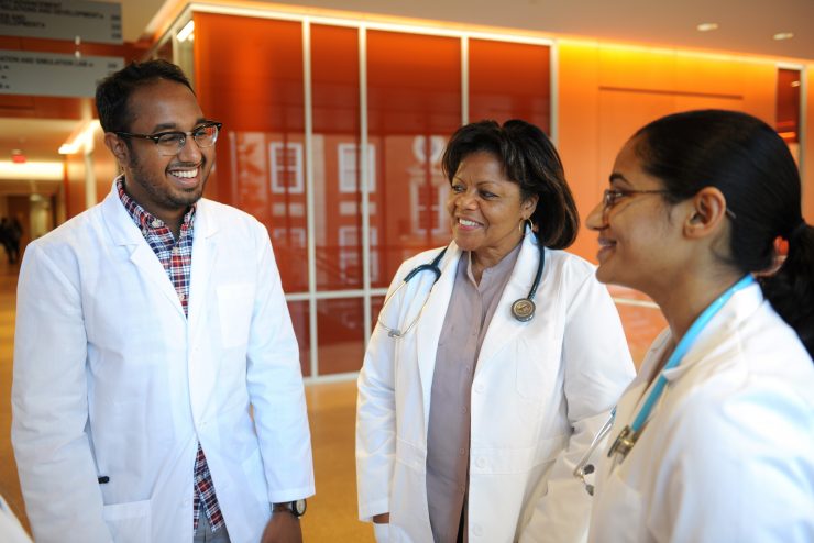 Nursing graduate students talking inside the Nexus Building at Adelphi.