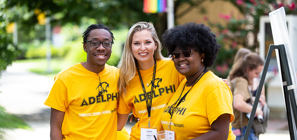 Orientation leaders smiling at Adelphi