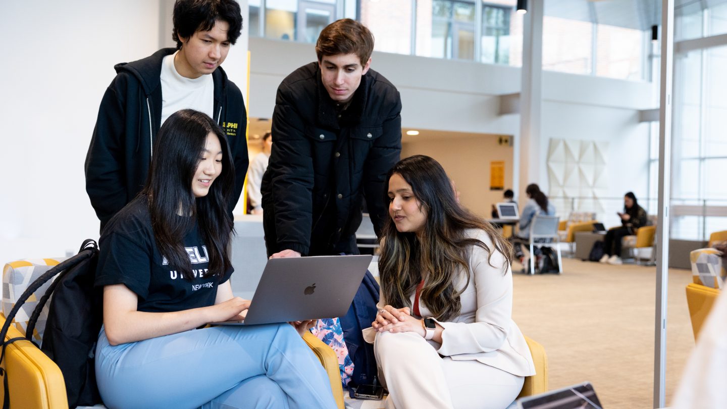 Students working on a laptop