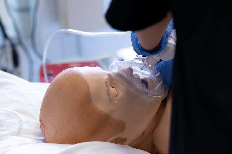 Nursing simulation lab - close up on a mannequin receiving oxygen