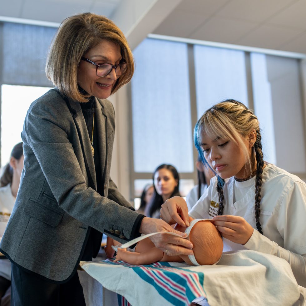 Adelphi professor Mancini Nursing Lab with infant simulation