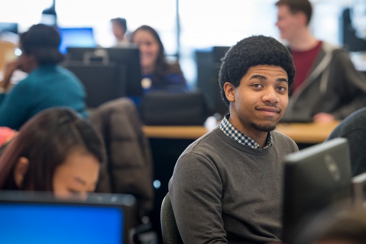 Student in the computer lab in Swirbul Library