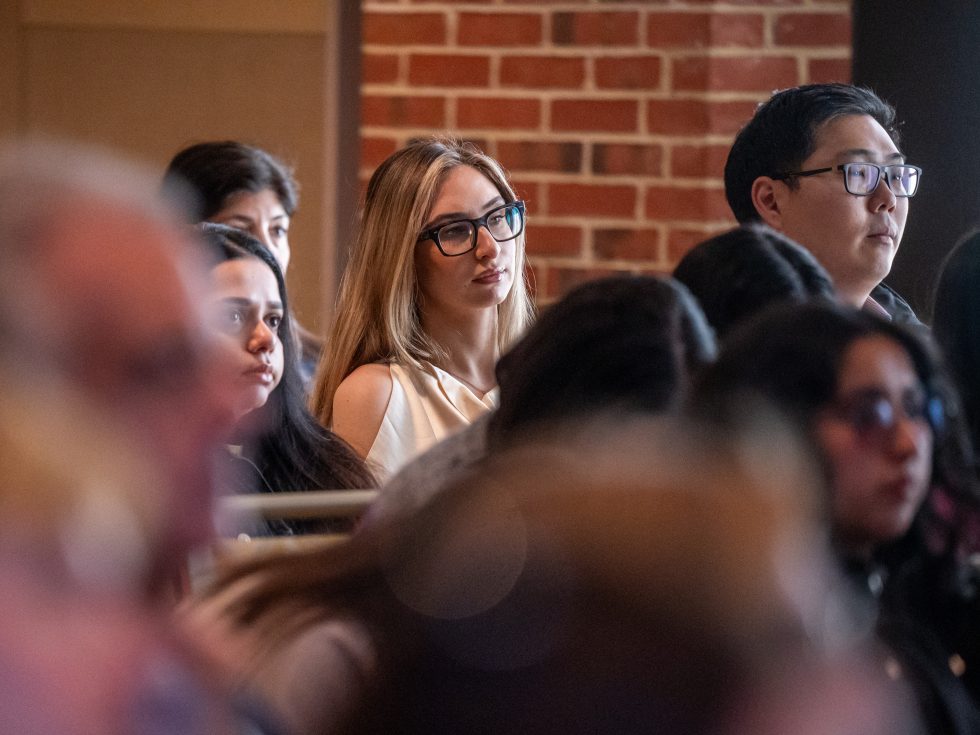 Employees listening to a presentation. 