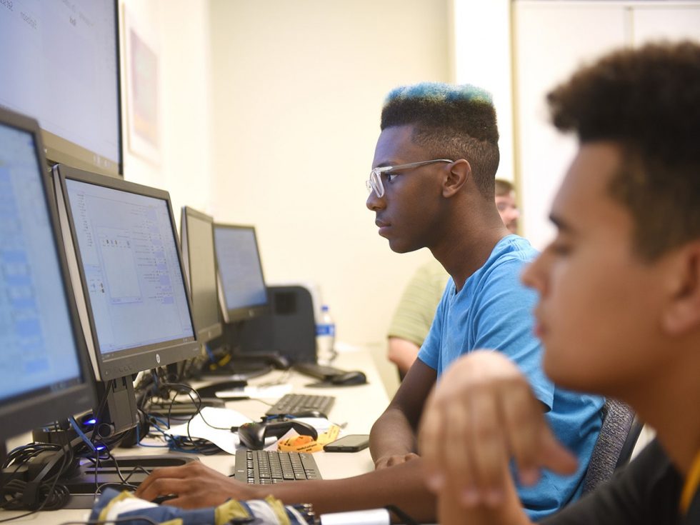 Students using desktop computers in the lab at Adelphi.