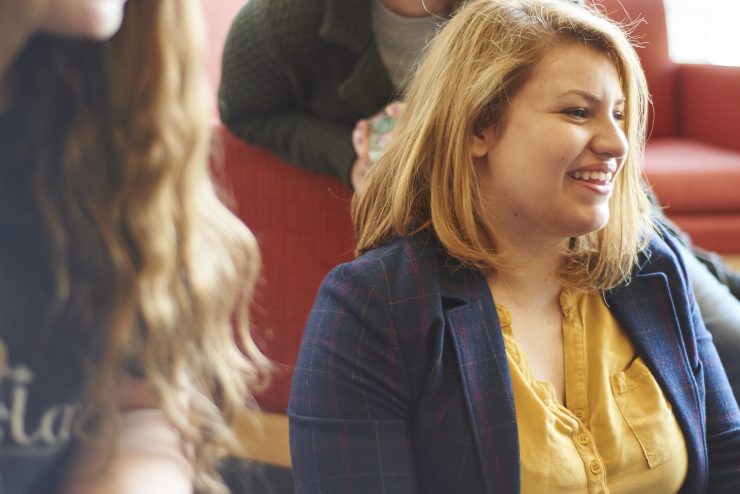 Adelphi acting students laughing together in a group