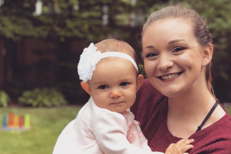 Jillain Vanderneut holding her infant child