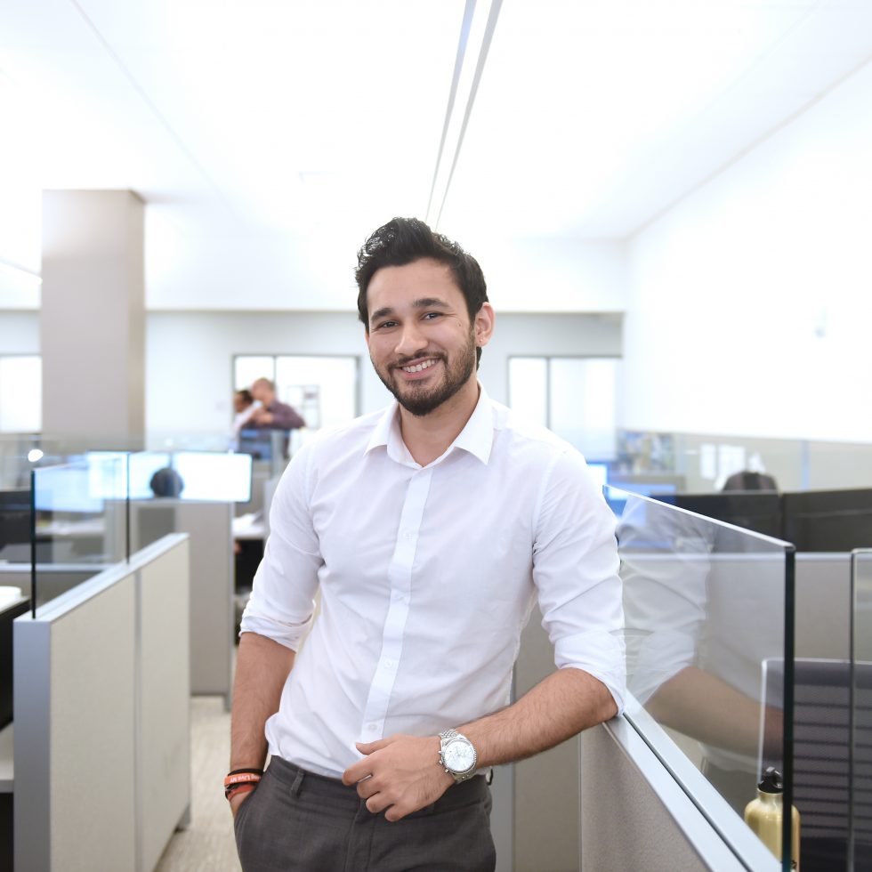 An Adelphi student dureing his internship at nonprofit Lighthouse offices.