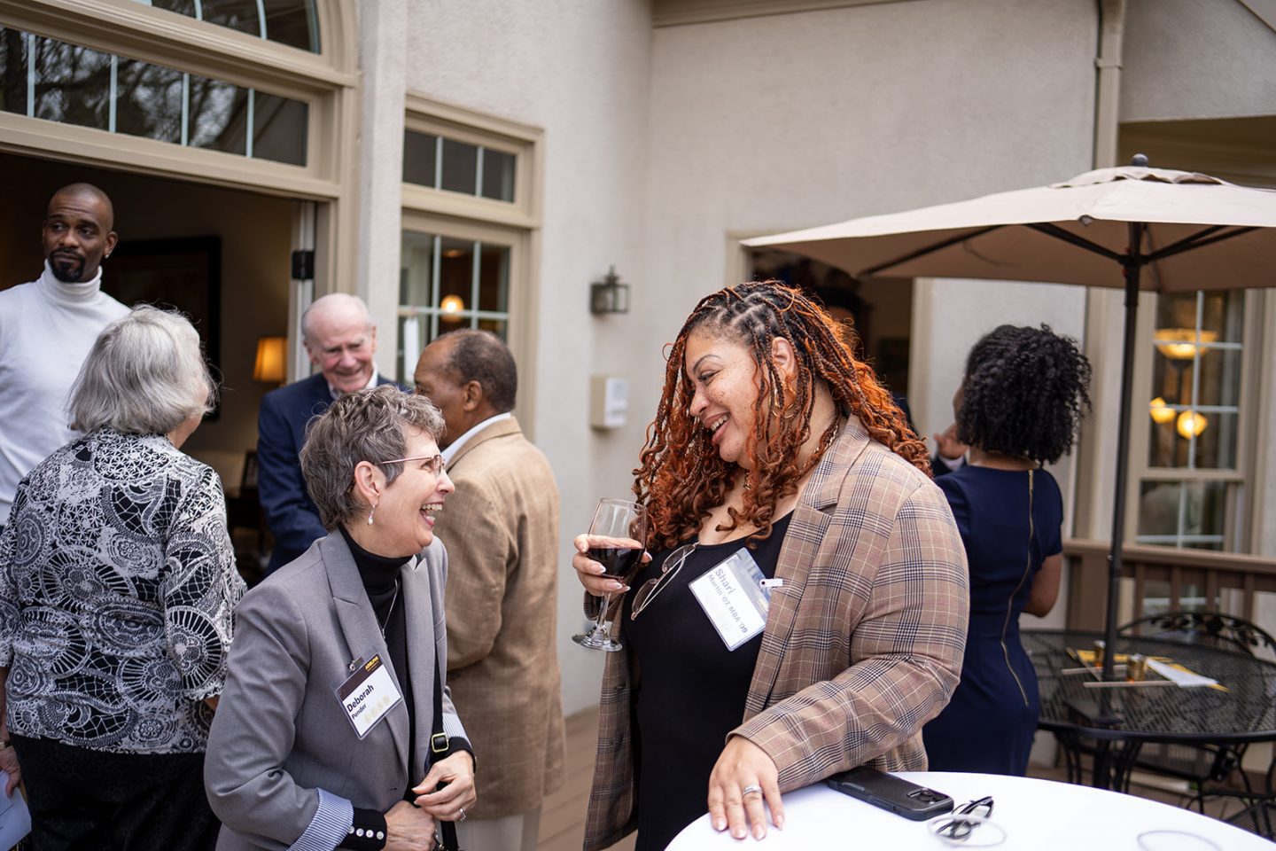 Fellow alumni enjoy reminiscing about their time at Adelphi.