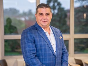 Headshot of Kris Amplo