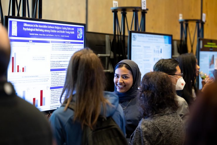 Students presenting during the Research Conference