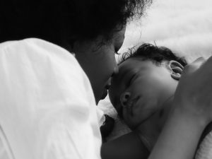 Mother and infant in black and white