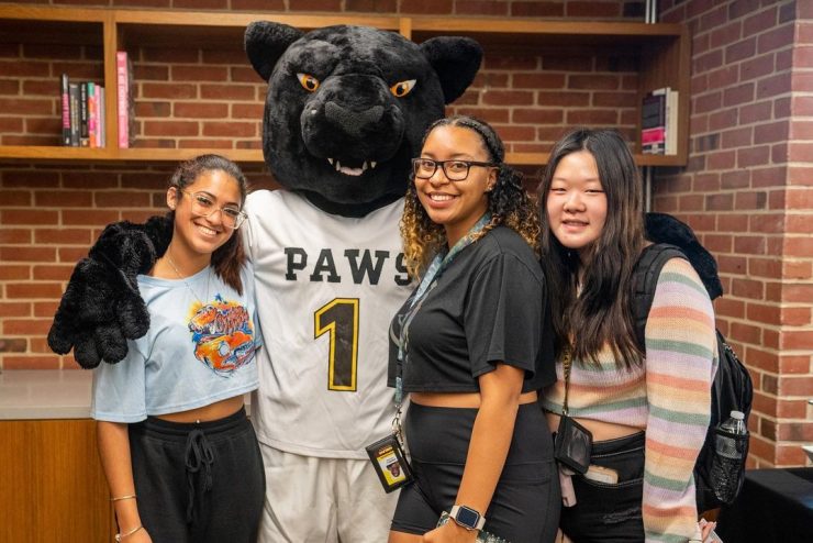Multicultural Center at Adelphi's UC - Students pose with the mascot