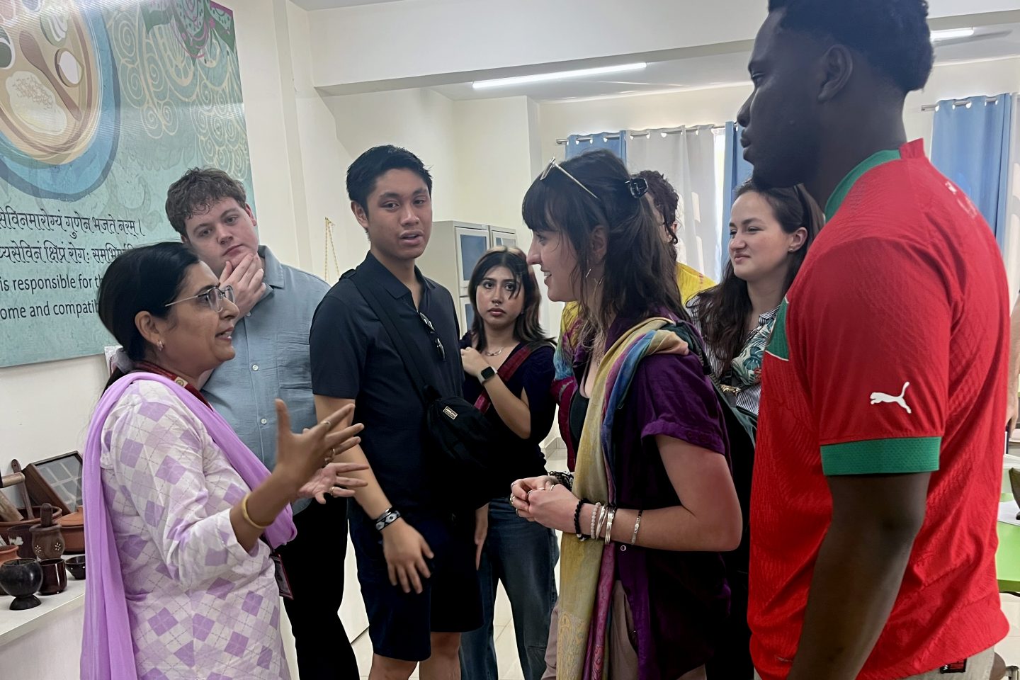 Bhisé Global Learning Experience students listen to faculty at the All India Institute of Ayurveda, exploring how traditional healing practices and modern healthcare intersect in contemporary India.